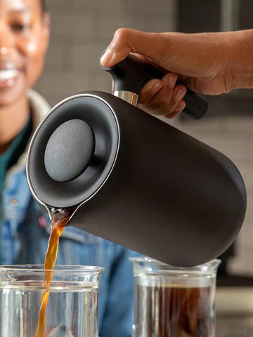FELLOW Clara French Press pouring coffee